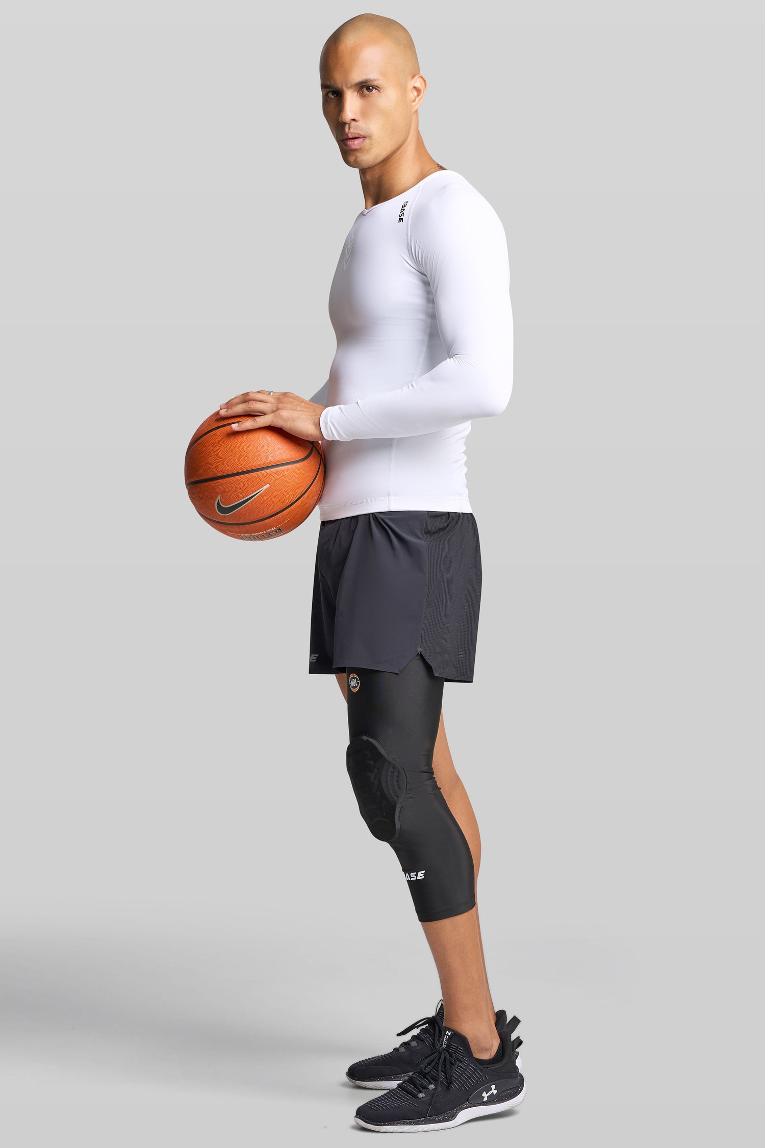 BASE + NBL Compression Curved Padded Knee Guard (Single) - Black