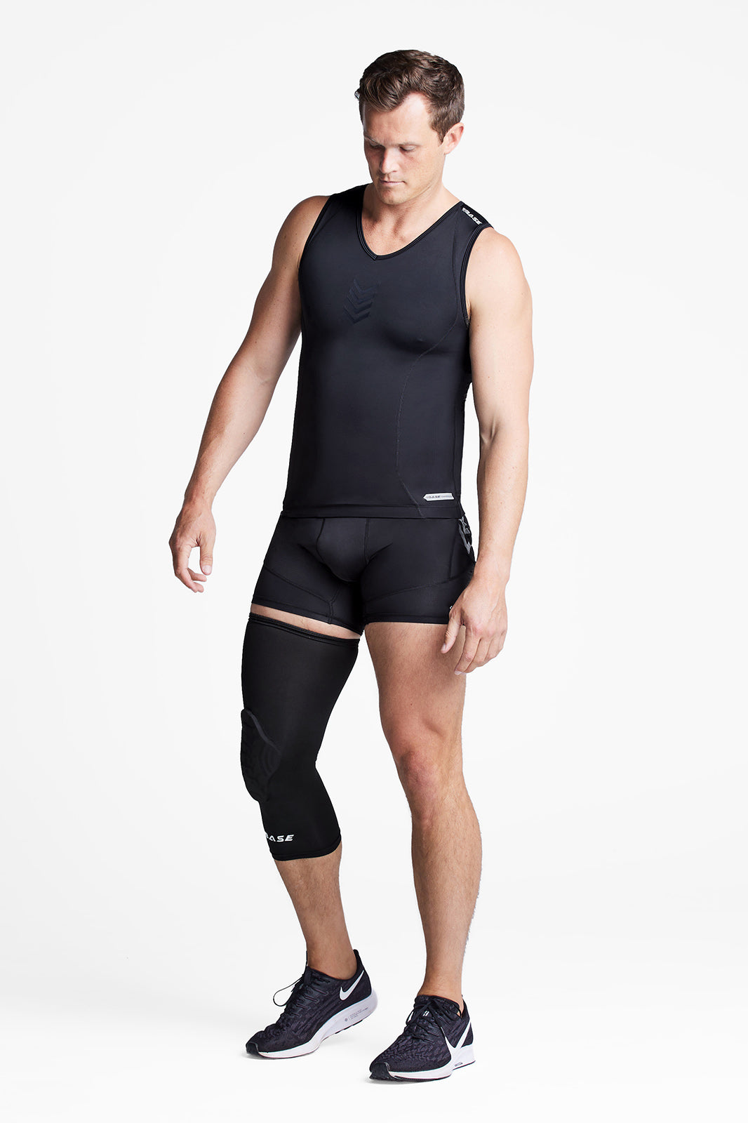 Compression shorts with best sale knee pads